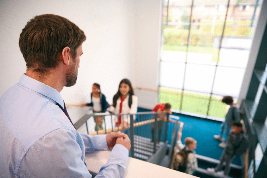 School leader observing students